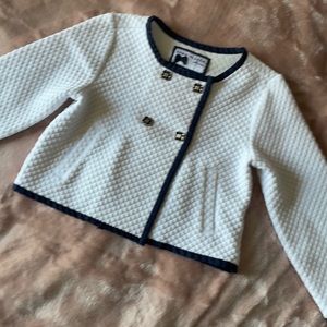 Cutest Janie and Jack light Jacket with navy blue borders.